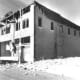 Brick walls of the old Custer Hotel, in Mackay, Idaho, damaged by the October 28, 1983, earthquake. (Photograph by the Idaho Falls, Idaho, Post-Register.)