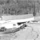 Damaged and collapsed buildings at the Blarneystone Ranch, near Hebgen Lake, Montana, caused by the August 18, 1959, earthquake. (Photograph by I.J. Witkind.)