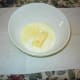 Heat the milk and butter until the butter melts. I use the microwave because it isn't as likely to burn that way.