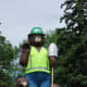 Smokey in a safety vest, celebrating 100 years of papermaking in International Falls