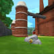 The Candy Corn Farm Lemon-head is behind the farm building, behind a rock.