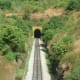 A long tunnel, which starts from Byndoor. But you can't pass through the same if you alight at the staton. It is a long tunnel amidst the beautiful scenery.