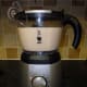 Add the blended bananas and milk to the Bialetti milk frother set to cool, to cool, mix and froth