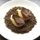 Pigeon breast fillets are carefully sat on top of mash