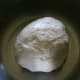 After the dough has risen, punch the dough down, divide it in two, and roll it out into two 15" x 8" rectangles. Roll the dough up into two long loaves.