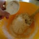 Add the remaining flour, 1/2 cup at a time, until a smooth dough forms.