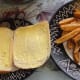 Cook chips and butter two slices of bread, crusts, bap or bread roll.