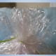 Cut the top of the cellophane so that it is even. Spread it out for a flower-like presentation.