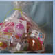 Gather the cellophane at the top of the basket and tie off with ribbon.
