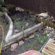 New retaining wall in friend's garden built for raised vegetable plot, to be back filled with soil once the wall has set firm.