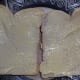Buttering the bread with margarine