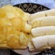 Adding the crisps to the bread
