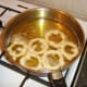 Deep frying sage and garlic onion rings