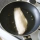 Cod fillet is fried with capers