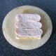 Turkey bacon is laid on first slice of bread