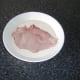 Dipping chicken breast in batter