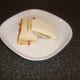 Bacon, pork and apple sauce sandwich is served