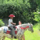 Delonte, one of Darlena's twin boys demonstrate his riding skills.