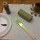 Paint the inside and outside of the toilet paper roll your desired color.