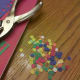Punch out colored circles from construction paper to glue on to your octopus.