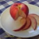 Cut thin slices of the fruit and layer in the pie crust.