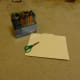 Start with scissors, thin cardboard or cardstock, and markers or colored pencils.