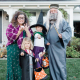 A Harry Potter family costume featuring Dumbledore, Professor Trelawney and two adorable witches.