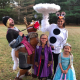 A Frozen-inspired costume featuring Elsa, Anna, Olaf, Kristoff and Sven.