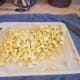 Step 9: Chop your zucchini and add it to the pot.
