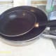 Stack dirty pots and pans