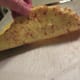 The underside of the baked spaghetti squash pizza crust looks like this after the first baking.