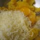 Adding the other ingredients to the squash mixture for the making of the crust.