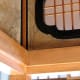 A room divider, letting in air and light.