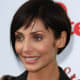 Short layered hairstyle with side fringe.