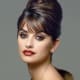 Penelope Cruz wears an Audrey Hepburn inpired Beehive topnotch