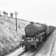 Class 8F 2-8-0 ex-LMS nears Kenilworth Junction with Type 6 freight - partly fitted (note lamp code, outer right and centre)