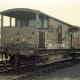 Nearest brakevan is ex-LMS in Departmental livery with standard (LNER design) behind on an engineer's train, screw couplings but shorn of vacuum pipe