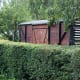 Willoughby, East Yorkshire, another plank sided BR van with corrugated steel ends - this time off its wheels as a 'shed' in someone's garden!
