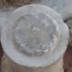 The center index top usually does not touch the birdbath basin bottom. Of importance is the matting surface for being as flat as possible.