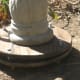Make the easy adjustments to the carriage nuts between the two boards. The nut at the end of the bolt will need to be turned clockwise to move the board upward.