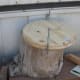 Here a stump used to look at the garden with is used for the flat surface for drilling the holes. A Workmate by Black & Decker is a good tool to use too.
