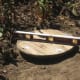 The final touch is checking for level. Adjustments can be made pounding on a spare stake or board onto the base board at the stake location.