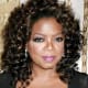 Oprah's medium-length curly hair