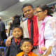 Sary Sok and Pon Nouv and their children, were beaming with smiles after the convention. They are members of the Cambodian congregation.