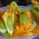Squash blossoms for sale at the Farmer’s Market at Imperial Sugar Land