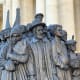 Statue commemorating migrants in St. Peter's Square, The Vatican,