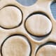 Shape the donuts using a donut cutter.