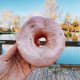 A strawberry-frosted donut
