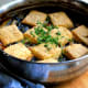 Collard cobbler with cornmeal biscuits