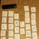 Write the phrase "Merry Christmas Ya Filthy Animal" one letter per page. Alternate marker colors for each letter.